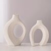 The handcrafted vase is designed with a unique scene - Image 5