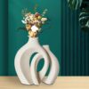 The handcrafted vase is designed with a unique scene - Image 10