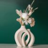 The handcrafted vase is designed with a unique scene - Image 2